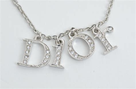 dior necklace with dior letters|christian Dior charm station necklace.